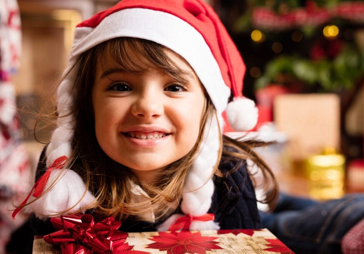 Christmas scene. girl with a gift Christmas scene. girl with a gift